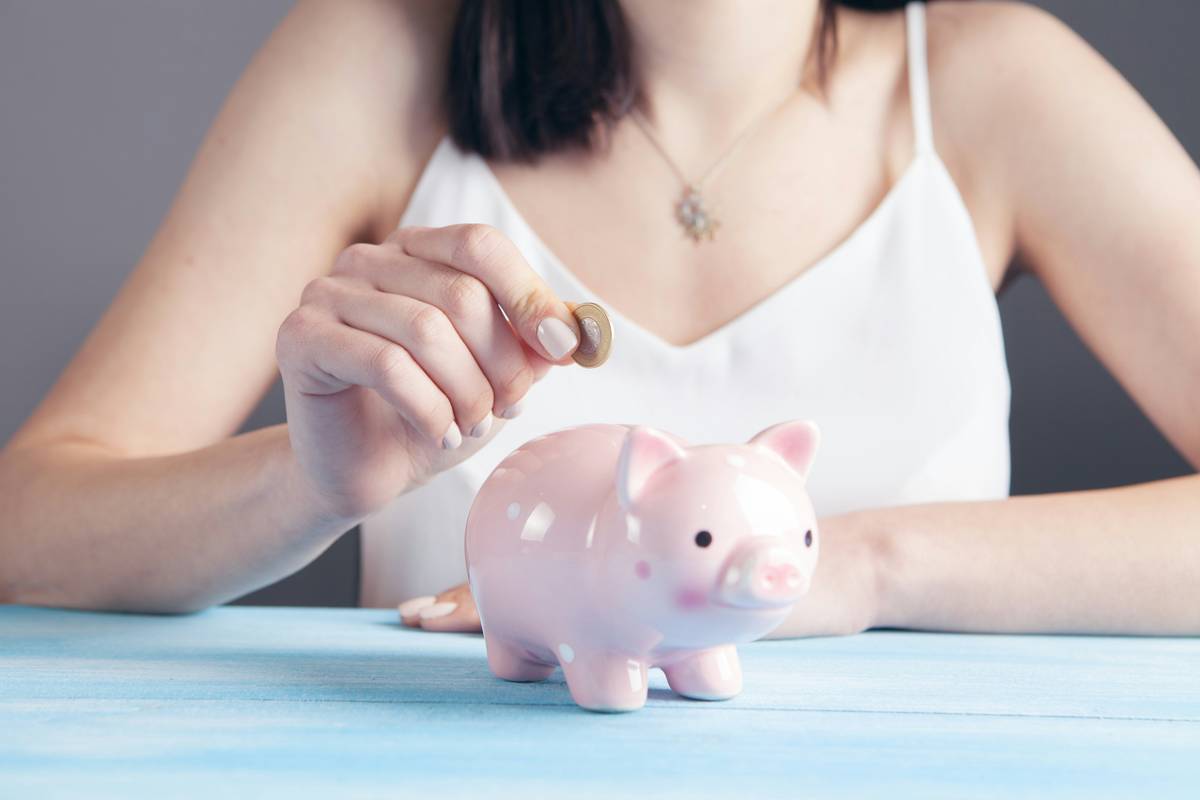Bar chart showing youth savings account usage: 68% higher deposits in accounts with automatic round-ups vs manual, 3x more logins with goal-tracking features